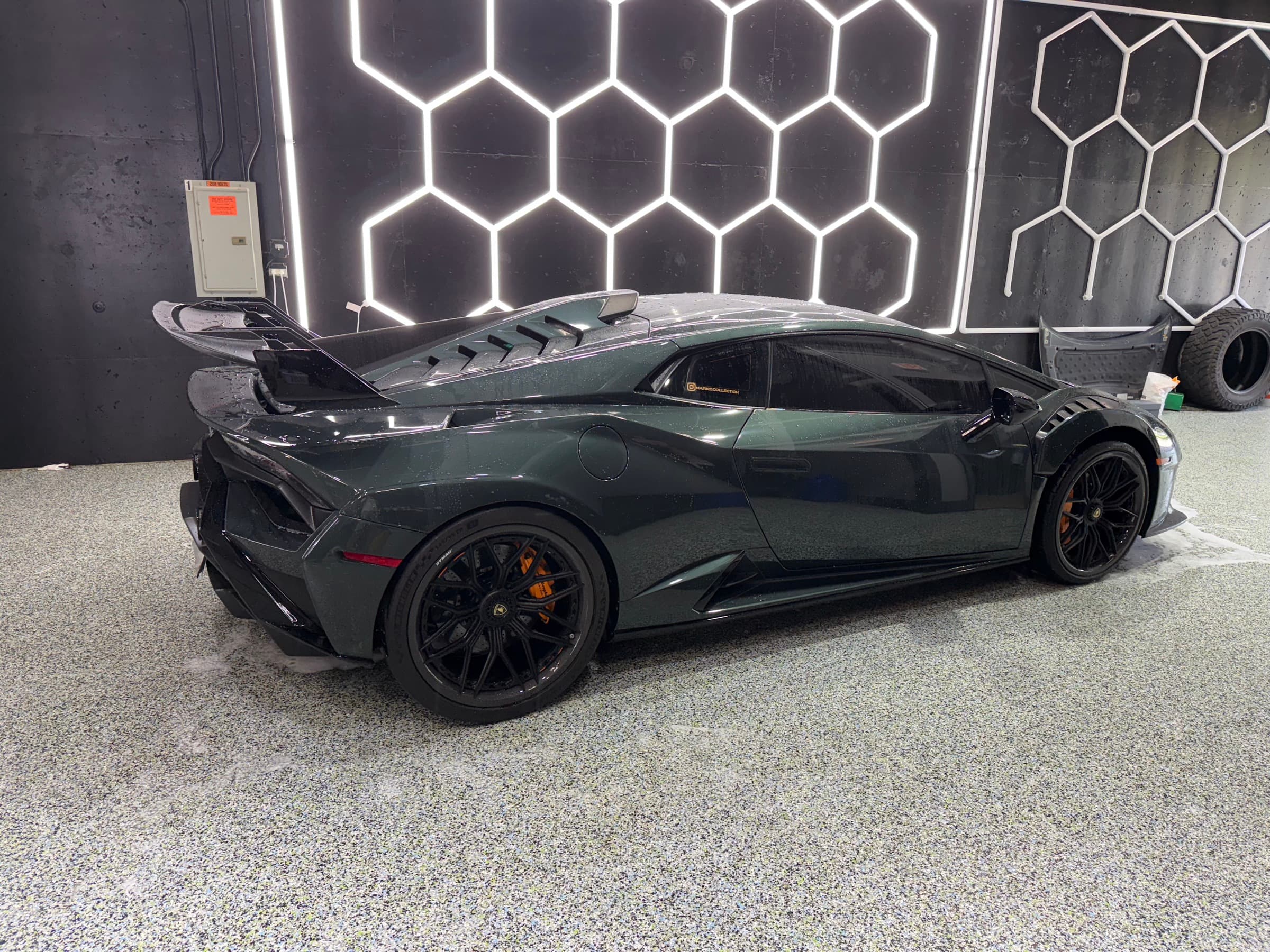 Dark green Lamborghini Huracán in the CHM Detailing Co. studio, Orland Park